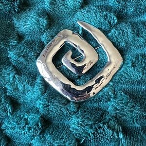 Silver tone Spiral Brooch stamped 1986